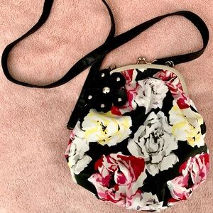 Claire’s flower clutch/purse.